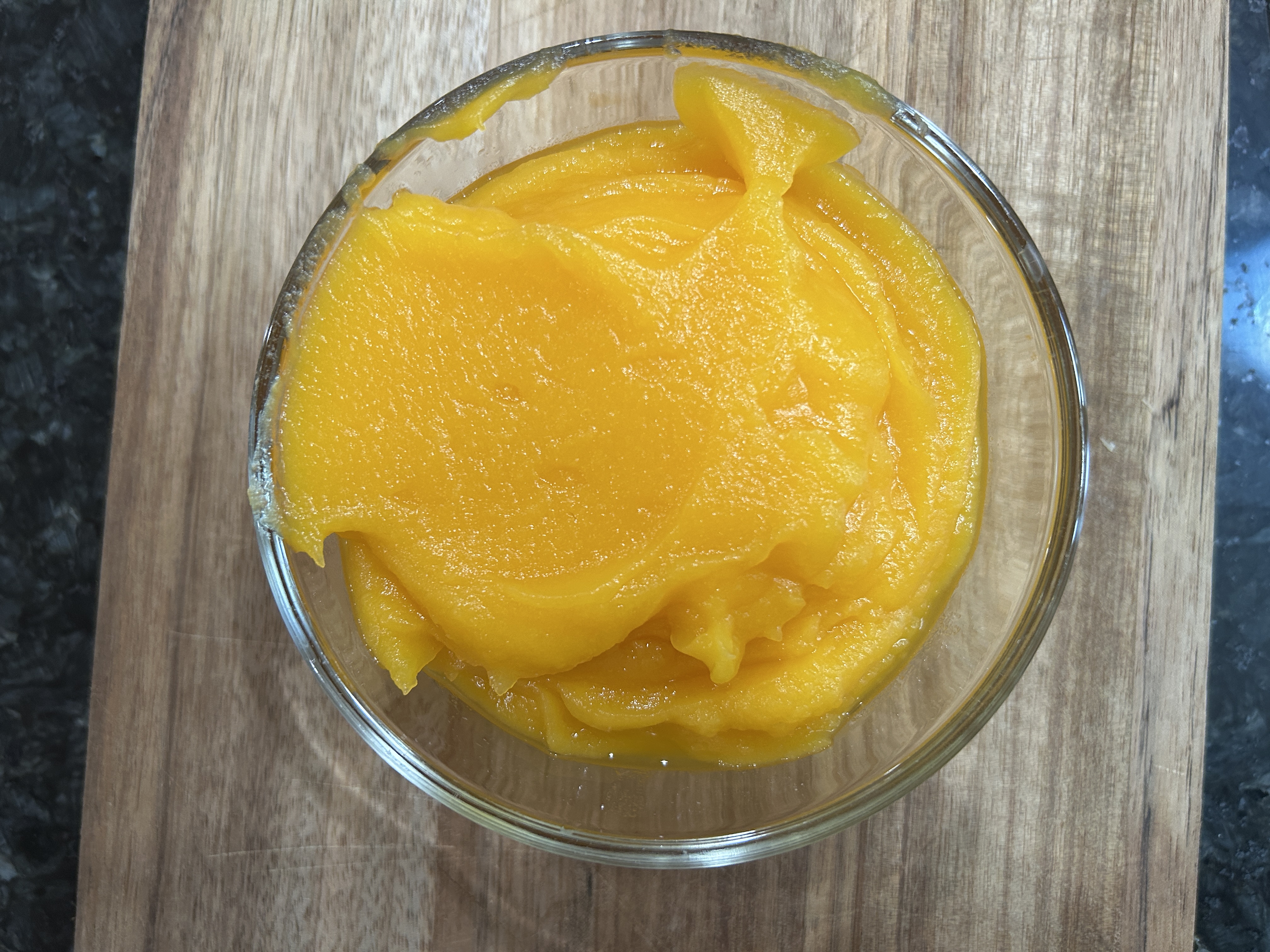 homemade pumpkin puree in a glass container
