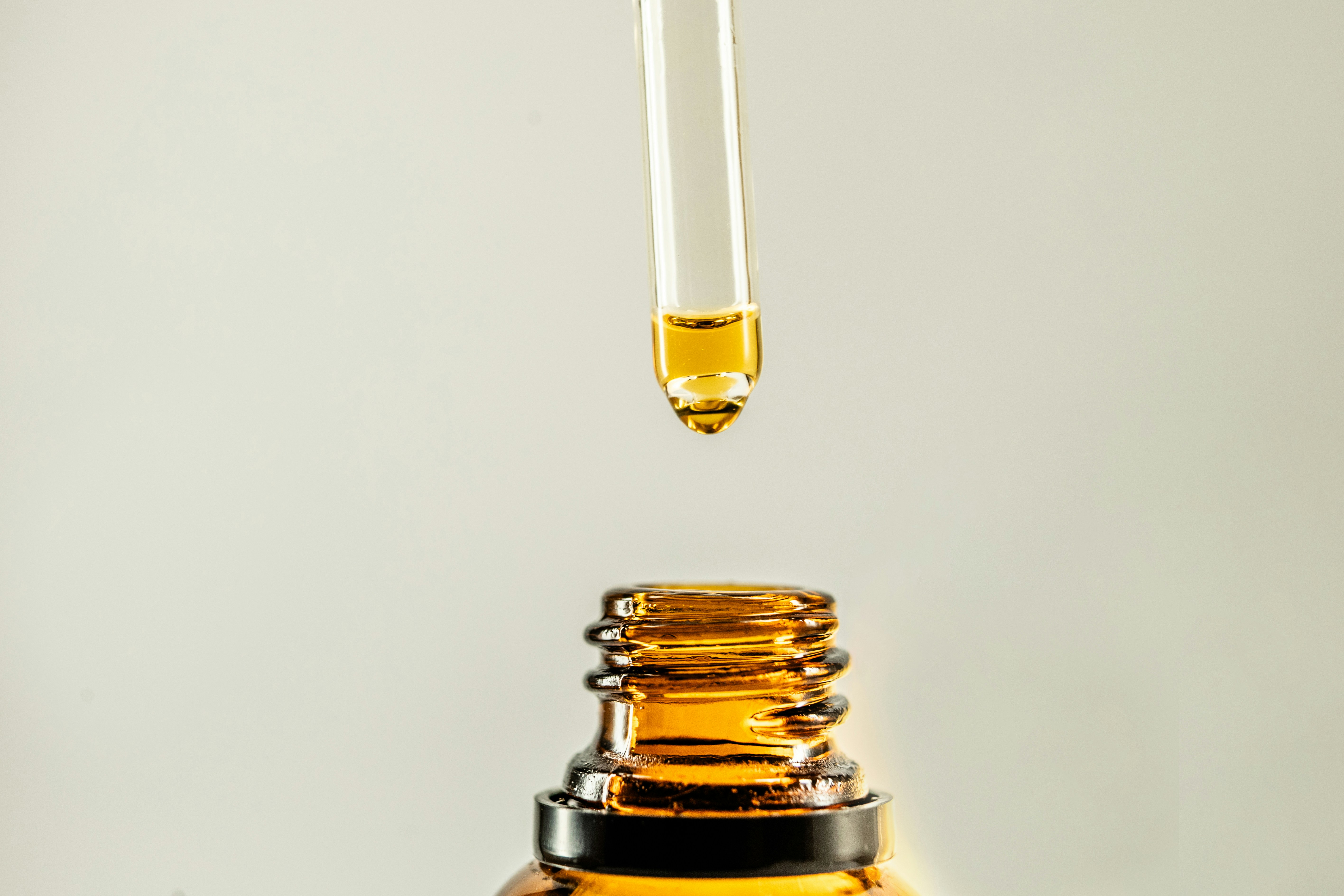 Closeup of tincture bottle and dropper